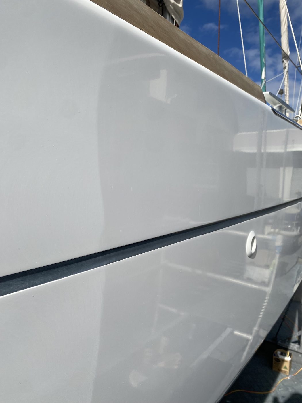 Boat deck gelcoat polished to a mirror shine, Brisbane