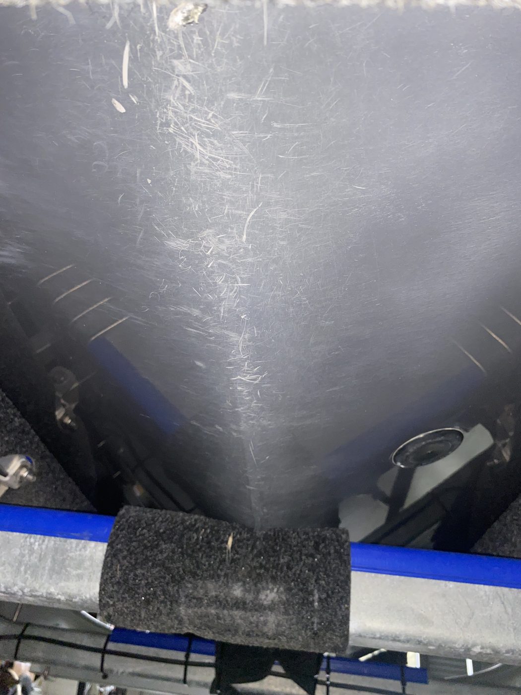 Boat hull keel and chine with heavy gelcoat abrasion and gouging before fibreglass repair, Brisbane
