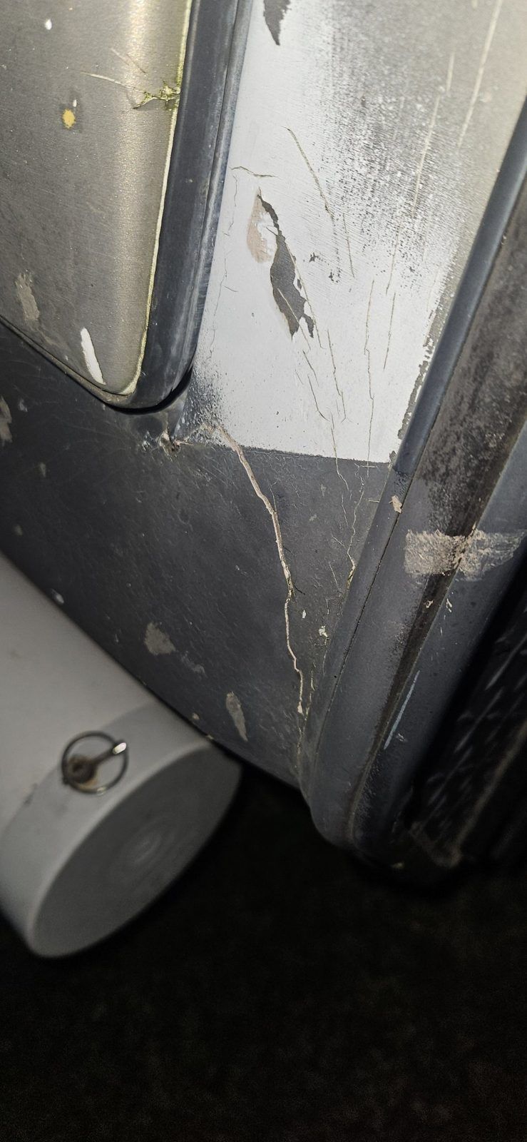 Caravan front lower panel with cracked finish before repair, Brisbane