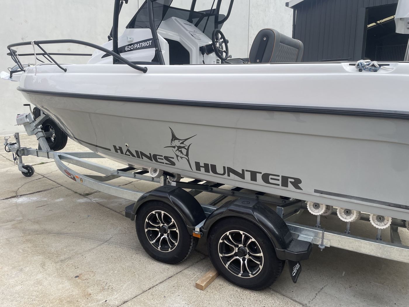 Haines Hunter centre console on its trailer after chine, strake and keel fibreglass repairs, Brisbane