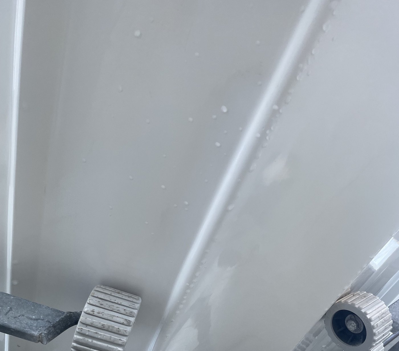 Boat hull strake with the gelcoat chips filled, re-gelcoated and polished back to the hull line, Brisbane