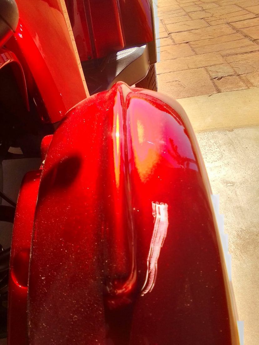 Mobility scooter mudguard with crack damage before fibreglass repair, Brisbane