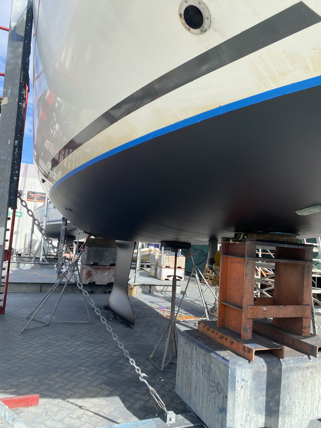 Sailboat keel and masked waterline detail, Brisbane boatyard