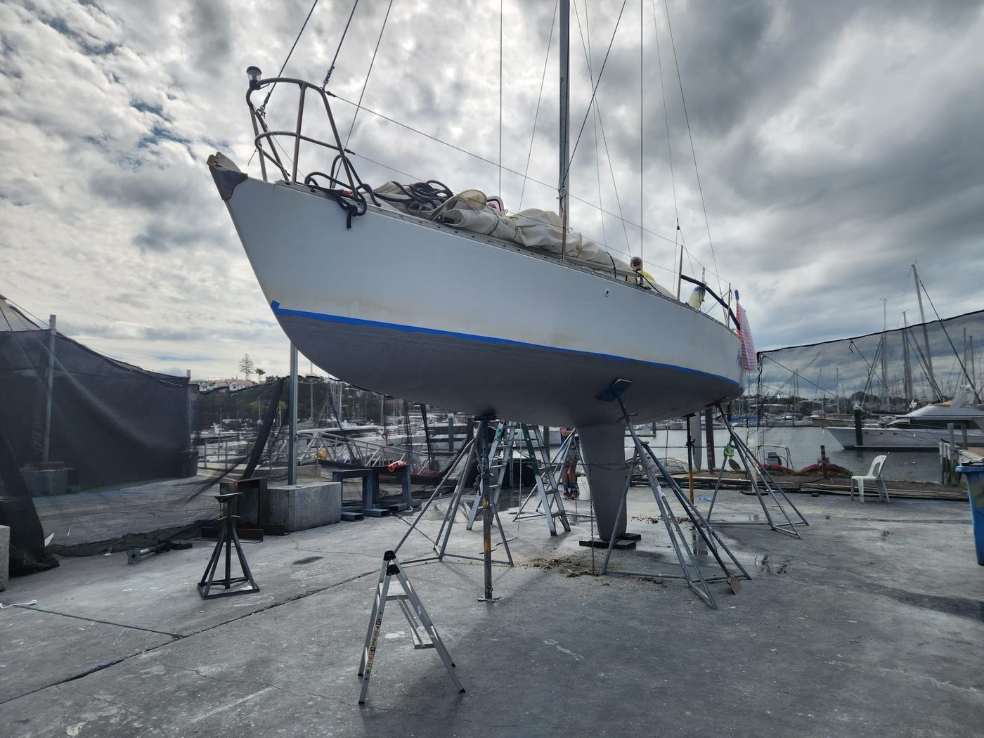 Sailboat hull primed and faired ready for antifoul, Brisbane boatyard