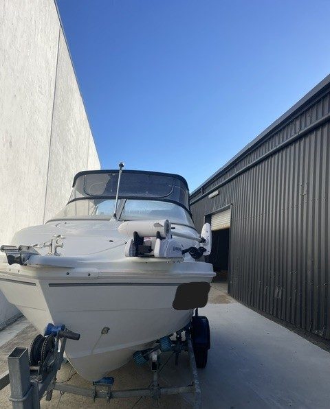 Bow view of a custom trolling motor mount and anchor mount fitted to a fibreglass boat, Brisbane